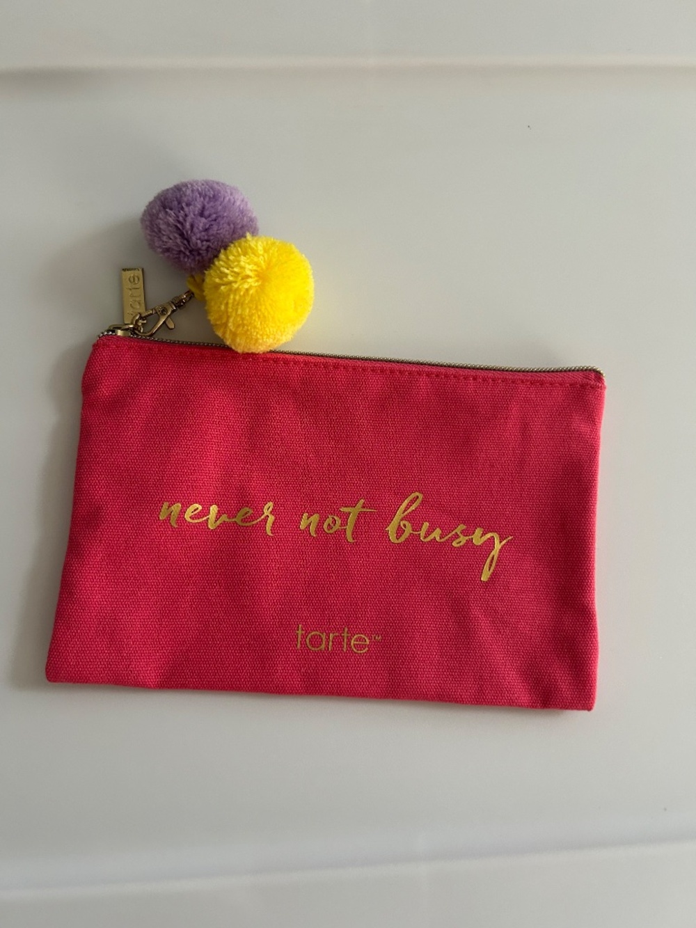 Tarte Make up pouch "never not busy" pink with pompoms NEW